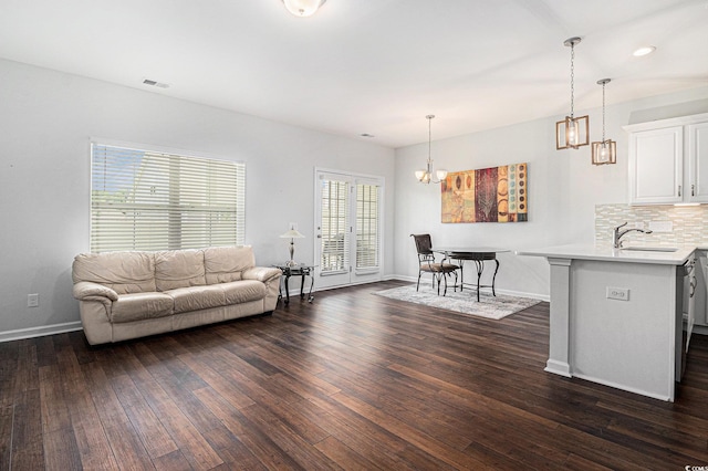 4051 Mclamb Ave Unit 4051, Little River, SC 29566 - living room featuring a chandelier and dark wood finished floors