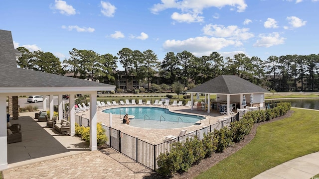 4051 Mclamb Ave Unit 4051, Little River, SC 29566 - community pool with a patio area, a gazebo, an outdoor living space, and a water view