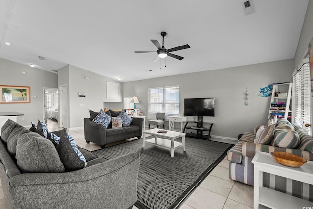 221 N Waccamaw Dr, Murrells Inlet, SC 29576 - living room featuring ceiling fan, light tile patterned floors, and vaulted ceiling