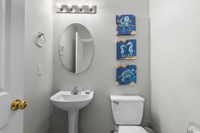 221 N Waccamaw Dr, Murrells Inlet, SC 29576 - half bathroom featuring toilet and a sink