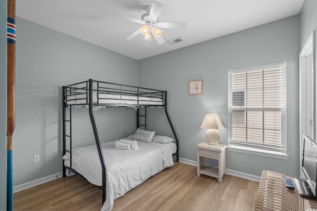 221 N Waccamaw Dr, Murrells Inlet, SC 29576 - bedroom with wood finished floors and ceiling fan