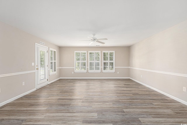 4645 Fringetree Dr Unit 10B, Murrells Inlet, SC 29576 - spare room with a ceiling fan and wood finished floors