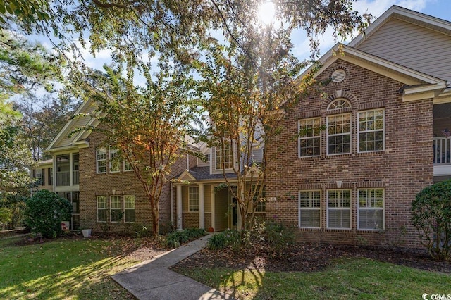 4645 Fringetree Dr Unit 10B, Murrells Inlet, SC 29576 - view of front facade featuring brick siding and a front lawn