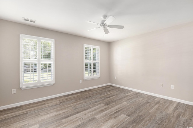 4645 Fringetree Dr Unit 10B, Murrells Inlet, SC 29576 - spare room featuring healthy amount of natural light, wood finished floors, and a ceiling fan
