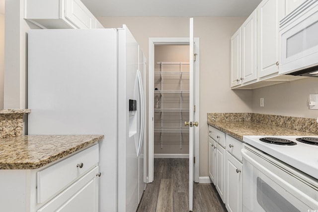 4645 Fringetree Dr Unit 10B, Murrells Inlet, SC 29576 - kitchen with white appliances, dark wood-style flooring, white cabinetry, and light countertops
