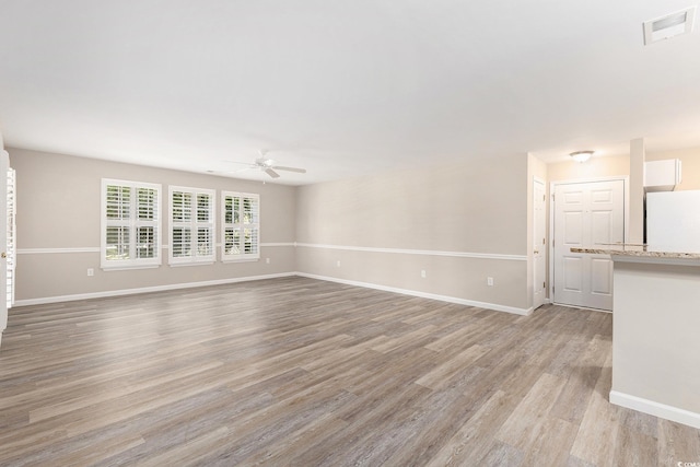 4645 Fringetree Dr Unit 10B, Murrells Inlet, SC 29576 - spare room with a ceiling fan and light wood-style floors