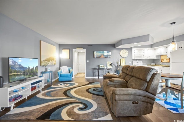 4222 Pinehurst Dr Unit I-9, Little River, SC 29566 - living area with wood finished floors and baseboards