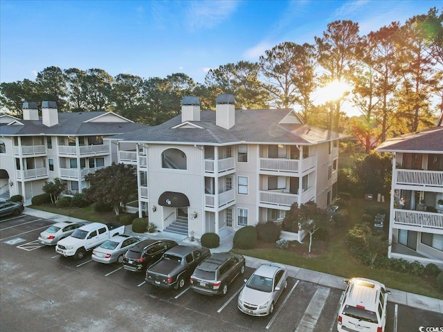 4222 Pinehurst Dr Unit I-9, Little River, SC 29566 - view of building exterior with uncovered parking