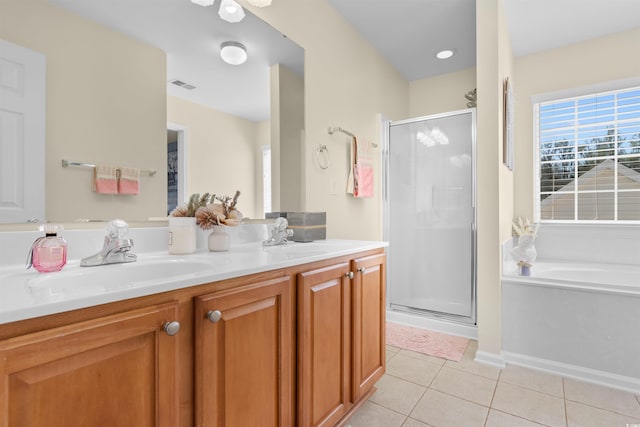 864 Barn Owl Ct Unit 864, Myrtle Beach, SC 29579 - full bath featuring a stall shower, tile patterned flooring, a garden tub, and double vanity