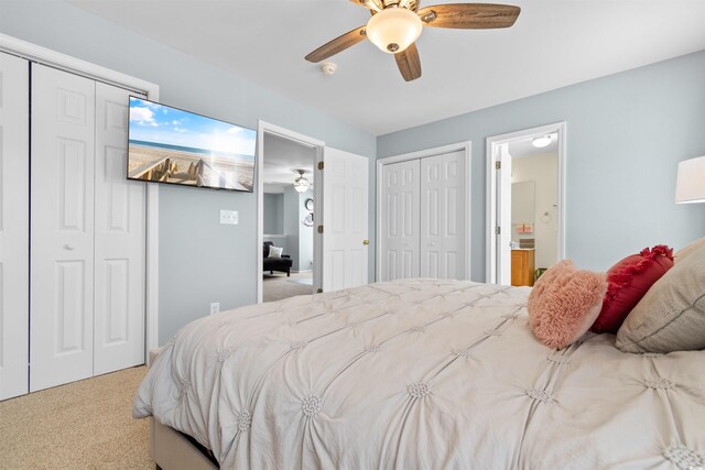 864 Barn Owl Ct Unit 864, Myrtle Beach, SC 29579 - bedroom with carpet, two closets, connected bathroom, and ceiling fan