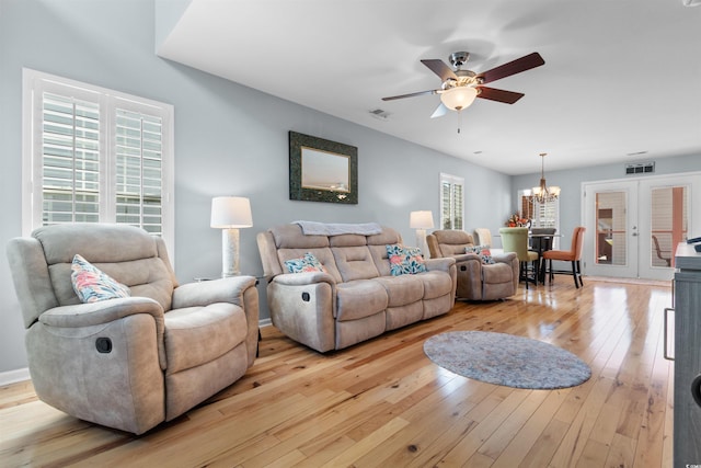 864 Barn Owl Ct Unit 864, Myrtle Beach, SC 29579 - living room featuring a chandelier, a ceiling fan, and light wood-style floors