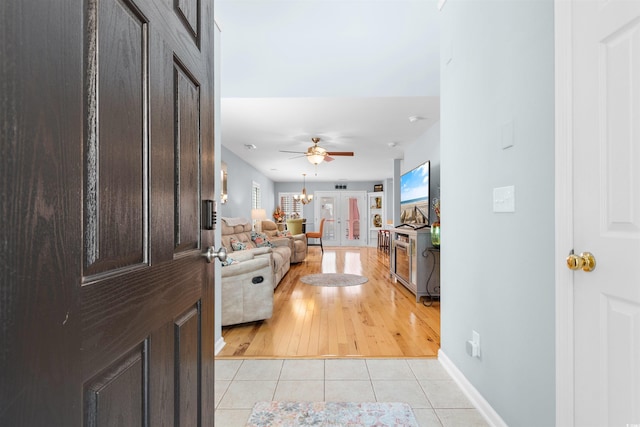 864 Barn Owl Ct Unit 864, Myrtle Beach, SC 29579 - entrance foyer with light tile patterned floors, french doors, and a ceiling fan