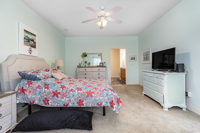70 Addison Cottage Way Unit 216, Murrells Inlet, SC 29576 - bedroom with light carpet, ceiling fan, and ensuite bath
