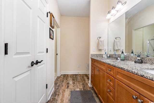 70 Addison Cottage Way Unit 216, Murrells Inlet, SC 29576 - bathroom with wood finished floors, double vanity, and an enclosed shower