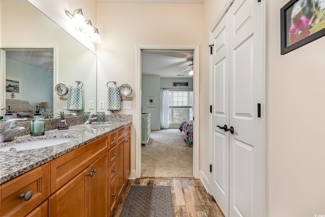 70 Addison Cottage Way Unit 216, Murrells Inlet, SC 29576 - ensuite bathroom featuring double vanity, a ceiling fan, and wood finished floors