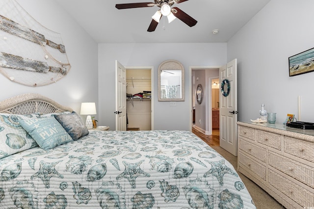 70 Addison Cottage Way Unit 216, Murrells Inlet, SC 29576 - bedroom with carpet flooring, a spacious closet, a ceiling fan, and a closet