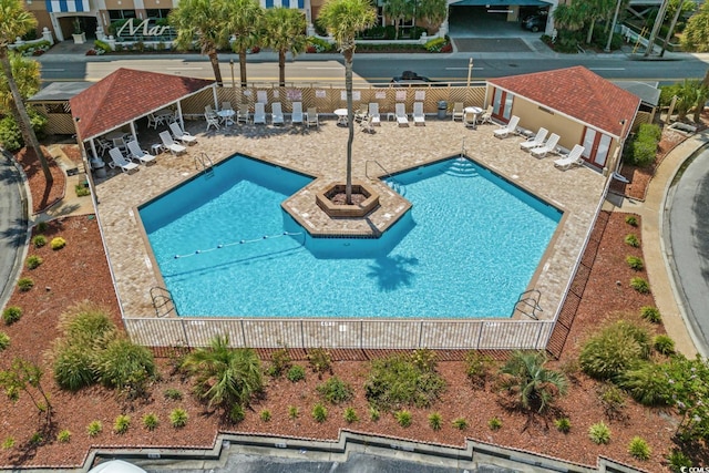 609 Hillside Dr S Unit D-17, North Myrtle Beach, SC 29582 - community pool featuring a fenced backyard and a patio