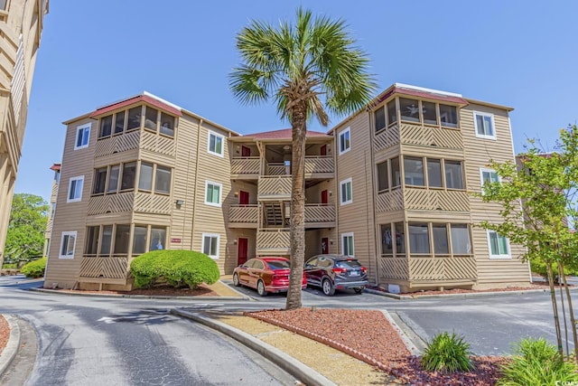 609 Hillside Dr S Unit D-17, North Myrtle Beach, SC 29582 - view of property with uncovered parking