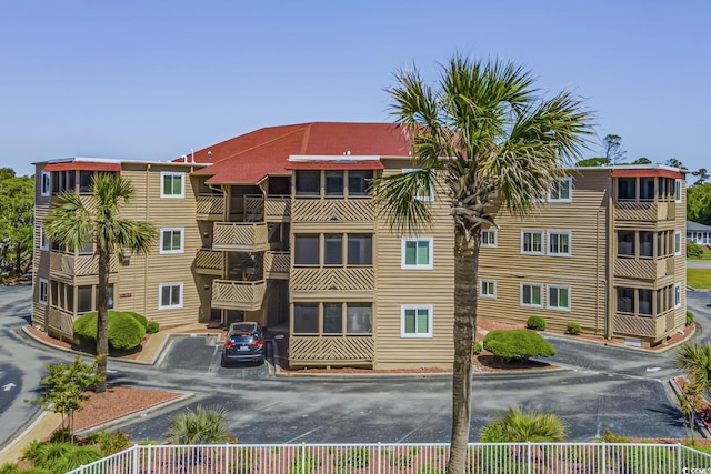 609 Hillside Dr S Unit D-17, North Myrtle Beach, SC 29582 - view of building exterior with uncovered parking