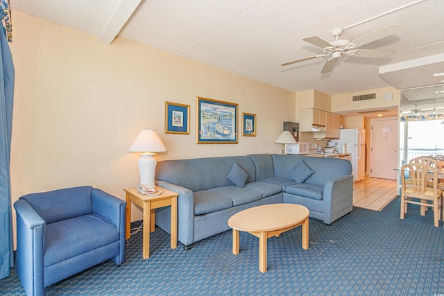 1304 N Ocean Blvd Unit 207, Myrtle Beach, SC 29577 - living area with a ceiling fan and light colored carpet