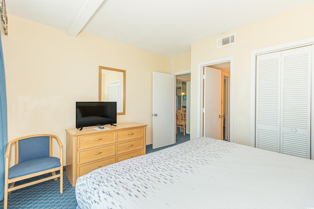 1304 N Ocean Blvd Unit 207, Myrtle Beach, SC 29577 - carpeted bedroom with a closet and beam ceiling