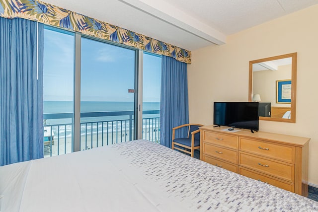 1304 N Ocean Blvd Unit 207, Myrtle Beach, SC 29577 - bedroom with multiple windows and access to outside