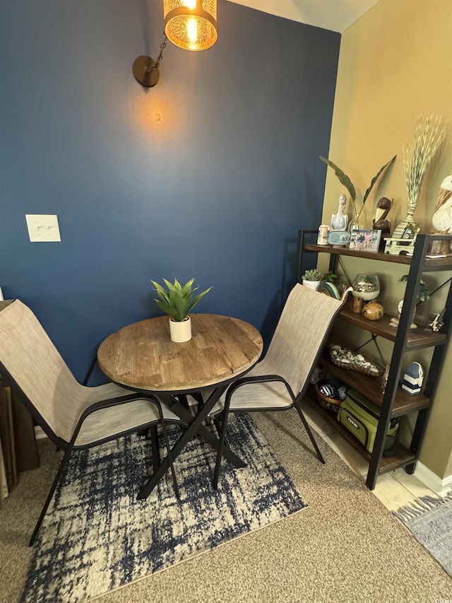 1851 Colony Dr Unit 5M, Surfside Beach, SC 29575 - dining room featuring carpet floors and baseboards