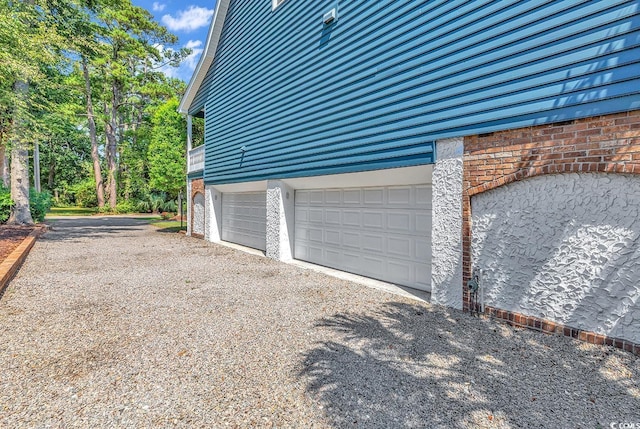315 14th Ave N, Surfside Beach, SC 29575 - garage featuring driveway