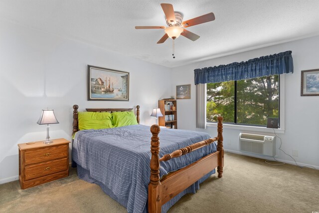 500 Eagle Way Unit 19, Little River, SC 29566 - bedroom with carpet floors, a wall mounted AC, and a ceiling fan