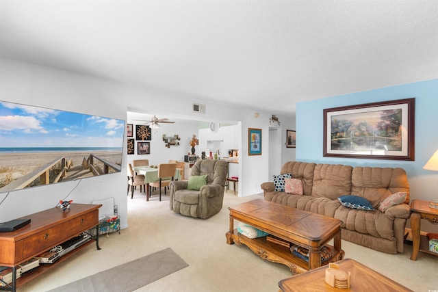 500 Eagle Way Unit 19, Little River, SC 29566 - carpeted living room with a ceiling fan