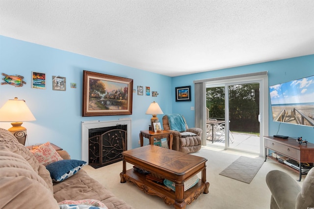500 Eagle Way Unit 19, Little River, SC 29566 - living room featuring carpet flooring, a textured ceiling, and a fireplace