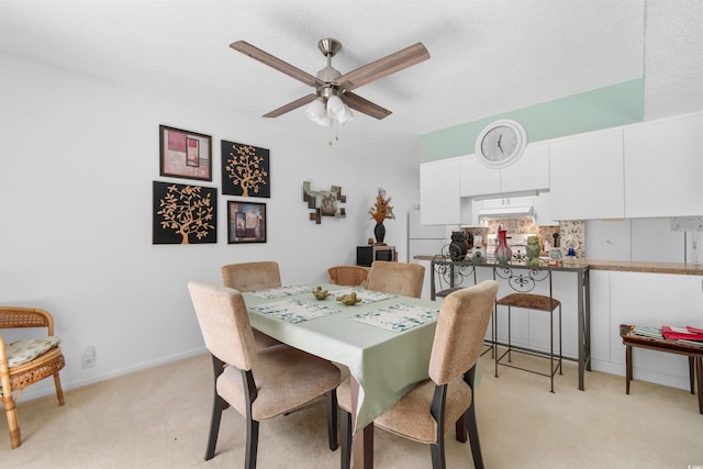 500 Eagle Way Unit 19, Little River, SC 29566 - dining room with light colored carpet and a ceiling fan