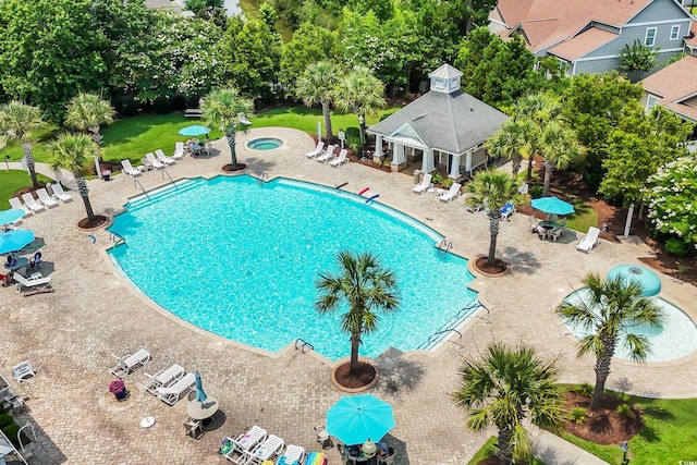 1276 Brighton Hill Ave, Myrtle Beach, SC 29588 - community pool featuring a community hot tub and a patio area