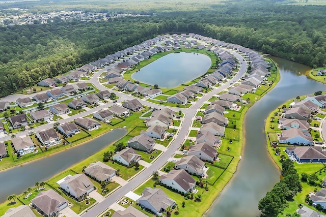 1276 Brighton Hill Ave, Myrtle Beach, SC 29588 - aerial view of residential area featuring a forest and a large body of water