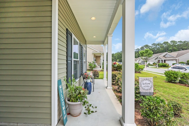 1276 Brighton Hill Ave, Myrtle Beach, SC 29588 - covered porch with a residential view