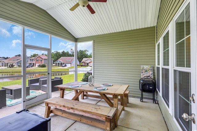 1276 Brighton Hill Ave, Myrtle Beach, SC 29588 - sunroom / solarium featuring a water view, ceiling fan, outdoor lounge area, lofted ceiling, and a residential view