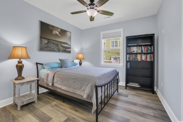 137 Pottery Landing Dr, Conway, SC 29527 - bedroom featuring wood finished floors and a ceiling fan
