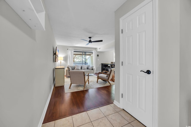 10301 N Kings Hwy Unit 21-4, Myrtle Beach, SC 29572 - living area featuring light tile patterned floors and ceiling fan