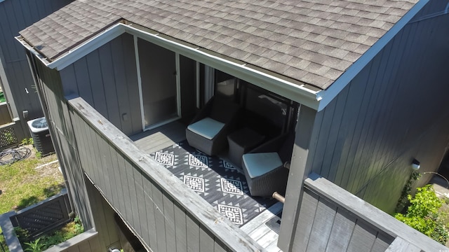 10301 N Kings Hwy Unit 21-4, Myrtle Beach, SC 29572 - exterior view of a shingled roof and a central AC unit
