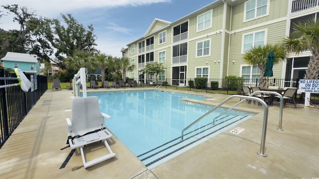 130 Puffin Dr Unit 2B, Pawleys Island, SC 29585 - community pool with a patio area