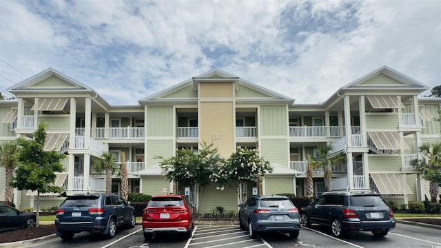 130 Puffin Dr Unit 2B, Pawleys Island, SC 29585 - view of apartment building / complex featuring uncovered parking