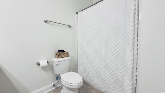 130 Puffin Dr Unit 2B, Pawleys Island, SC 29585 - bathroom featuring toilet and curtained shower