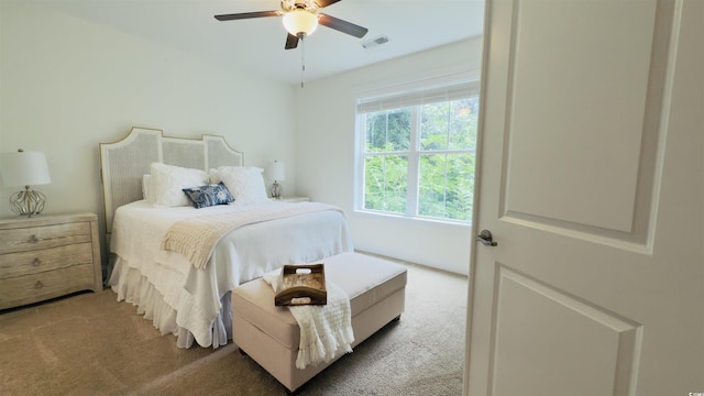 130 Puffin Dr Unit 2B, Pawleys Island, SC 29585 - bedroom with carpet floors and a ceiling fan