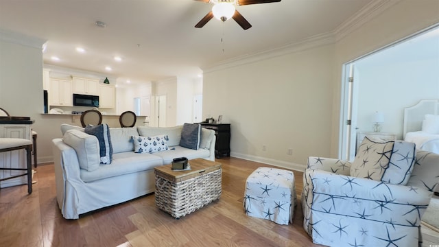 130 Puffin Dr Unit 2B, Pawleys Island, SC 29585 - living area with ceiling fan, ornamental molding, wood finished floors, and recessed lighting