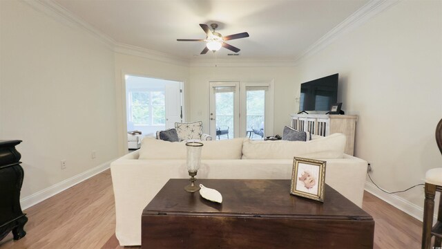 130 Puffin Dr Unit 2B, Pawleys Island, SC 29585 - living area with a ceiling fan, light wood-style floors, and crown molding