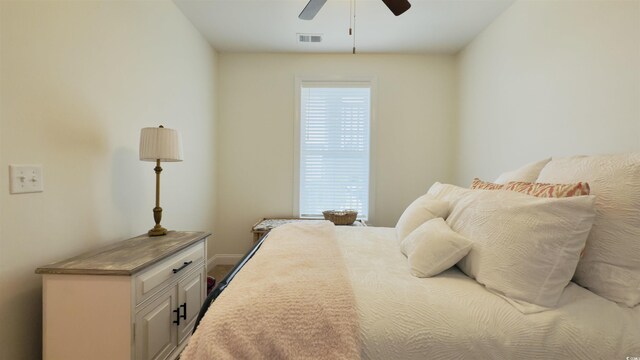 130 Puffin Dr Unit 2B, Pawleys Island, SC 29585 - bedroom with a ceiling fan and baseboards