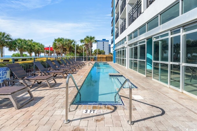 504 Ocean Blvd N Unit 410, Myrtle Beach, SC 29577 - community pool featuring a patio area