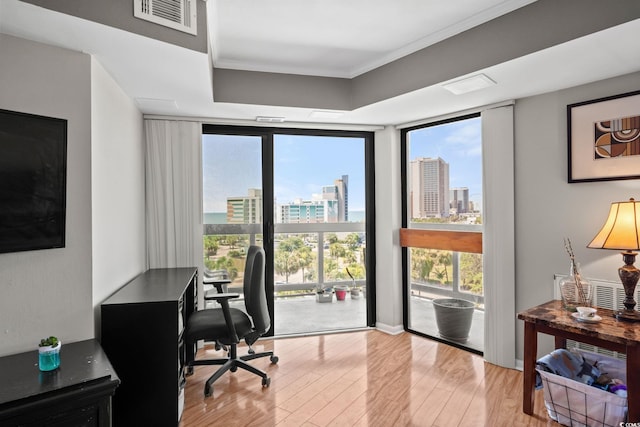 400 20th Ave N Unit 606, Myrtle Beach, SC 29577 - home office with expansive windows, healthy amount of natural light, wood finished floors, a view of city, and ornamental molding