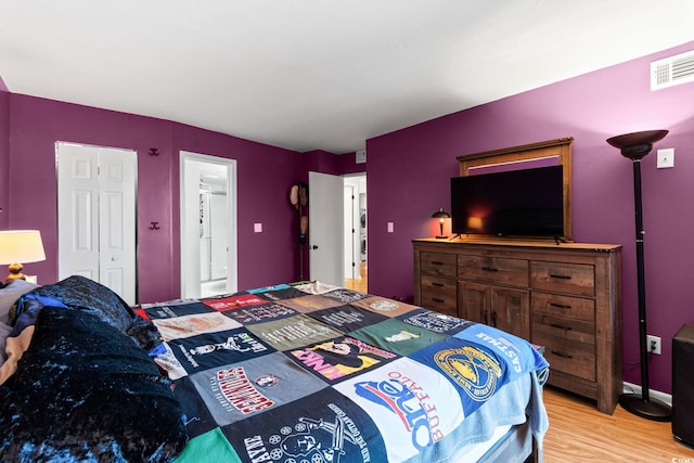400 20th Ave N Unit 606, Myrtle Beach, SC 29577 - bedroom featuring light wood-style flooring