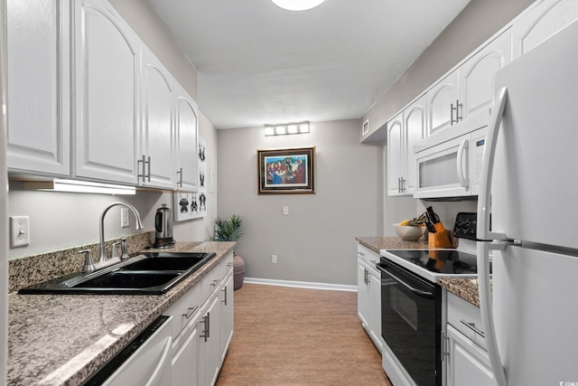 400 20th Ave N Unit 606, Myrtle Beach, SC 29577 - kitchen with white appliances and white cabinets